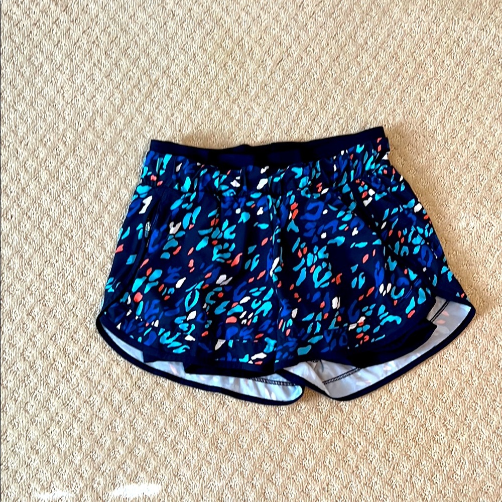 Sweaty Betty workout shorts. Multi color blue.  Size M